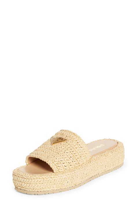 prada raffia sandals.